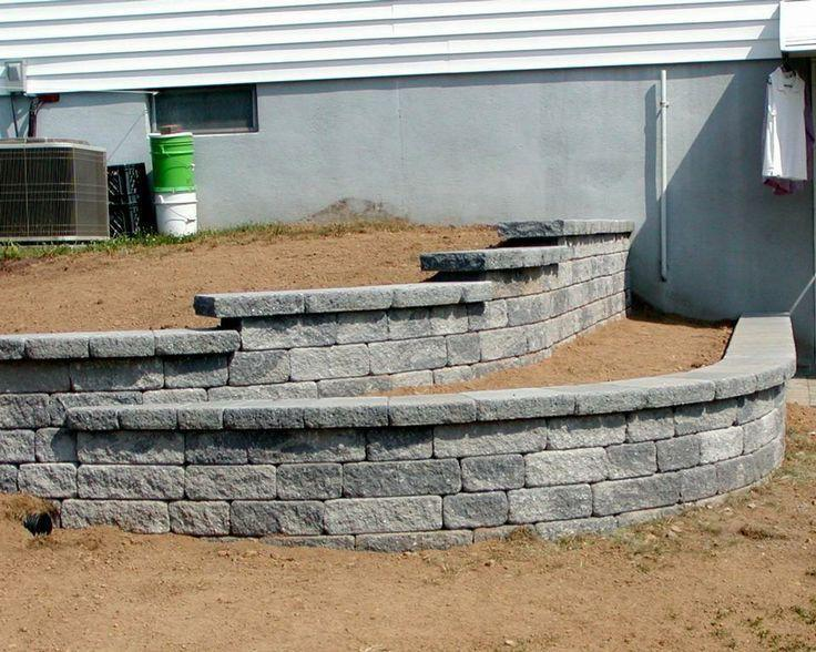Expert stone masonry craftsmanship, showcasing intricate stone wall design in New Jersey.