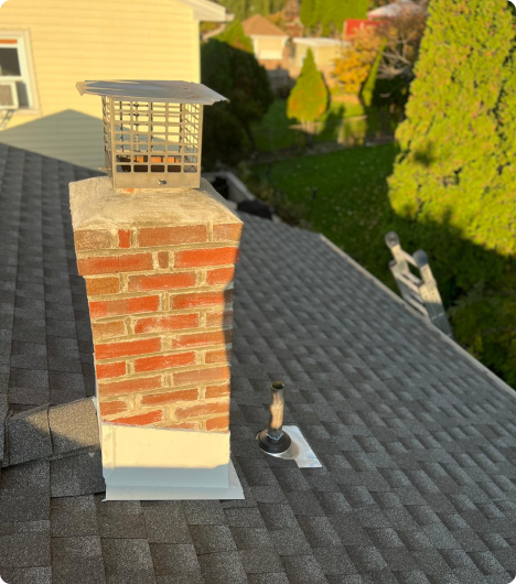 Beautiful chimney under sunlight after professional repair from Doda Brothers in New Jersey. 