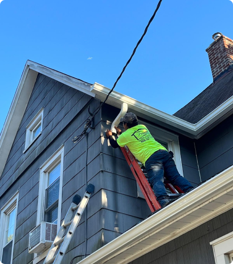 Doda Brother Construction expert working with gutters. 