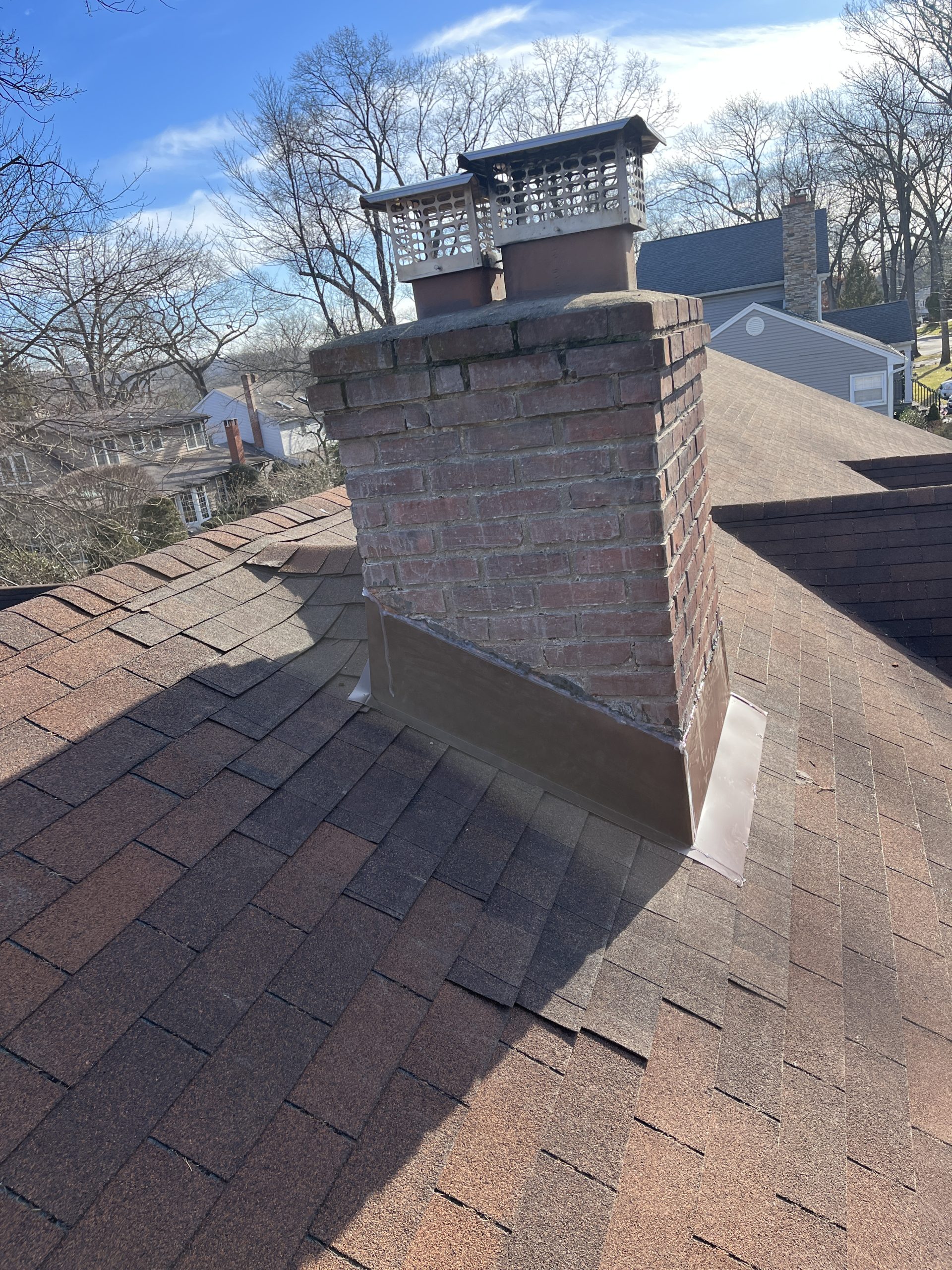Photo of a finished chimney repair from Doda Brothers. 
